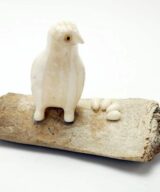 Vintage owl on bone nest